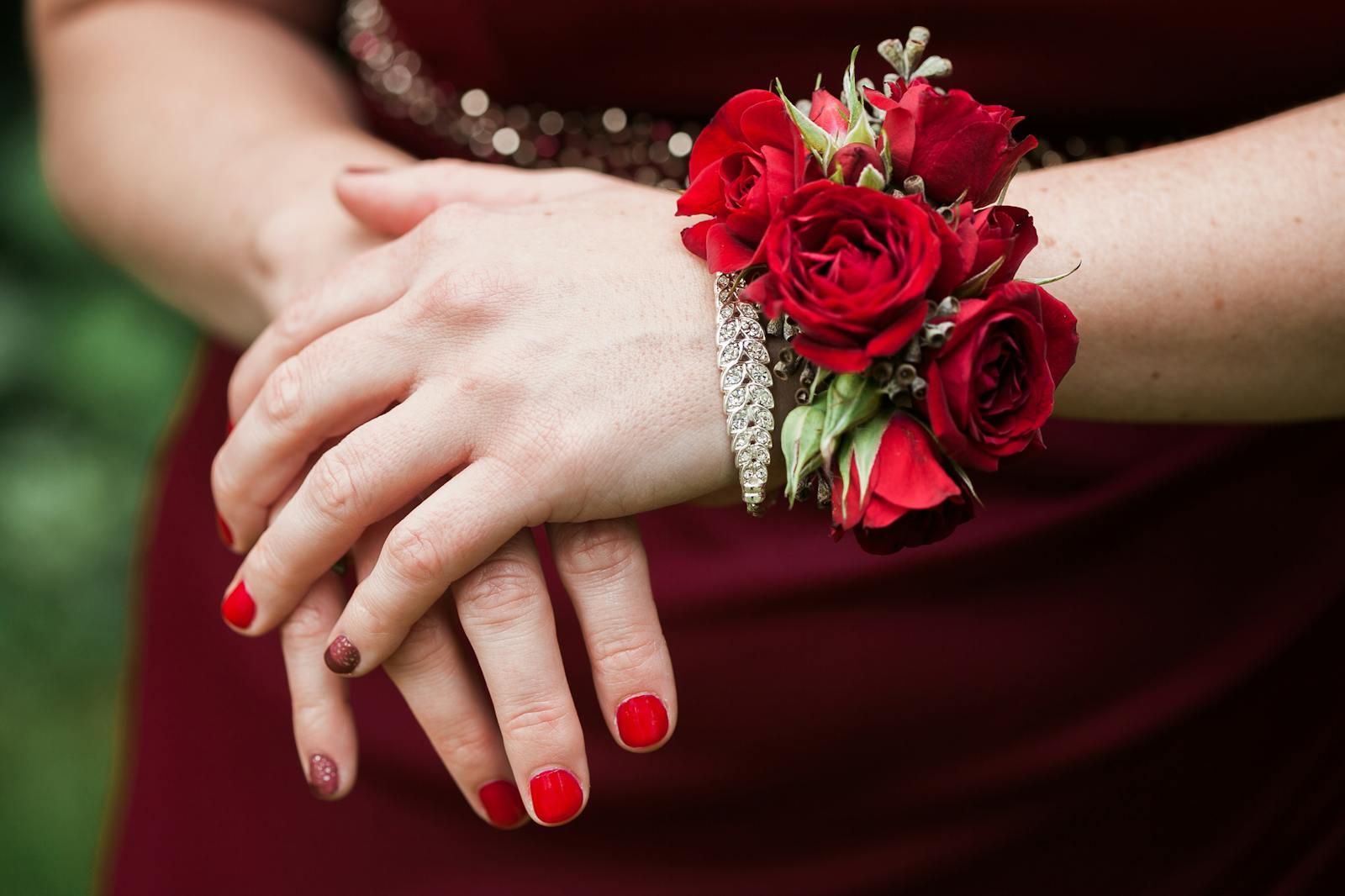 Wrist corsage of soft pink roses and baby's breath ready for a Sedalia prom night at Smith-Cotton High School